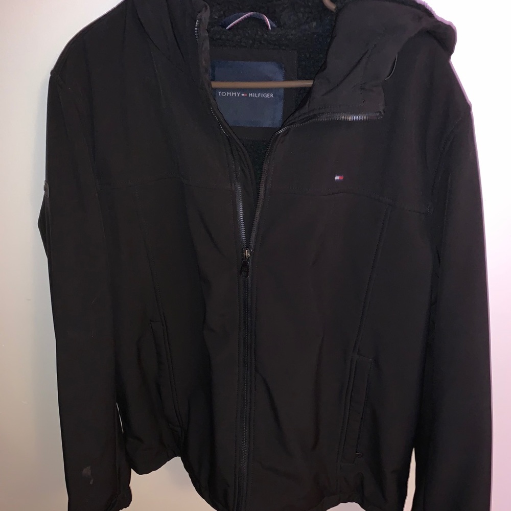 Tommy Hilfiger jacket fits more like a Large/XL.